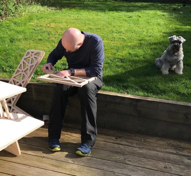 Taking advantage of the afternoon sunshine and sanding down prototype parts for photography tomorrow, with my loyal assistant, Baxter. #miniatureschnauzer #workingfromhome #homeoffice #workingoutside #laptopstand #standingdesk #standingdeskconverter #sanding #plywood #cnc #cncplywood #onemanandhisdog #productdesign #officefurniture