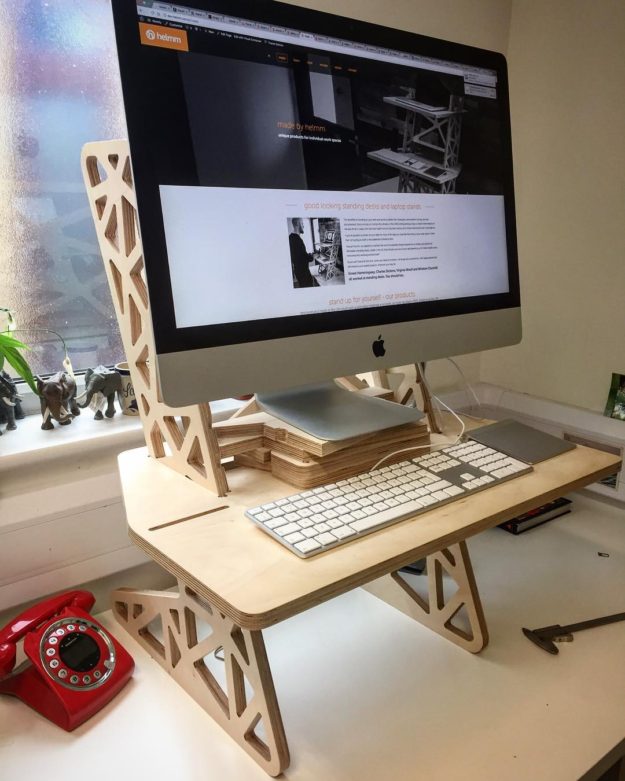 Testing out a prototype with a single shelf and few offcuts to raise massive 27″ iMac. Been working here all morning at it’s good! Think I’ll design an official support for this set up and make it an accessory for iMac users.