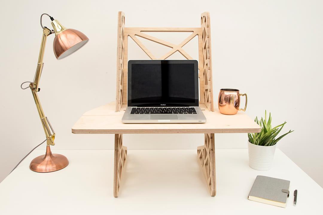 Although you should aim for using your laptop with a separate keyboard and mouse for the perfect ergonomic position, sometimes all you need is one shelf, and some inspiration