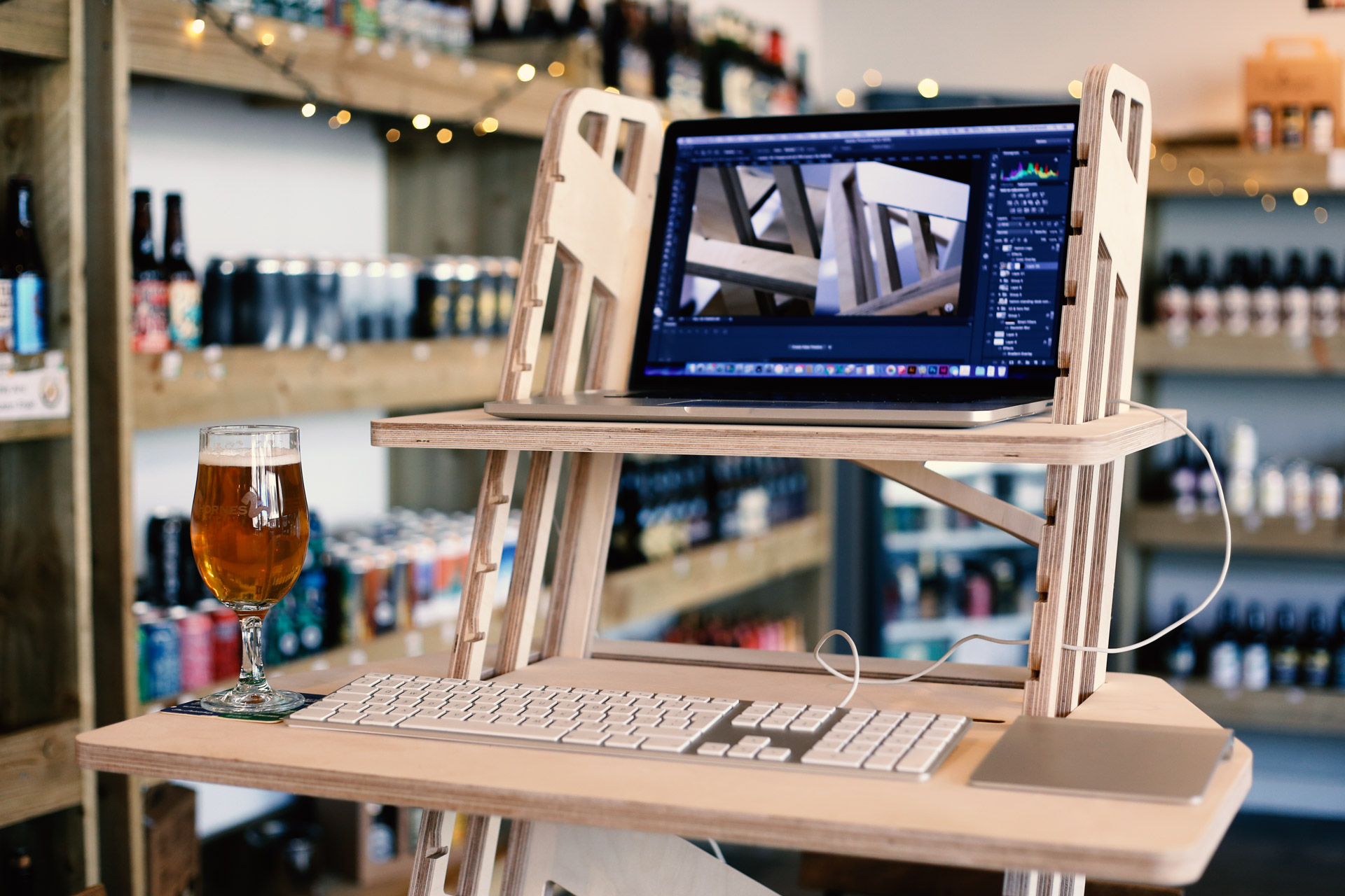 Wooden standing desk in a beer shop